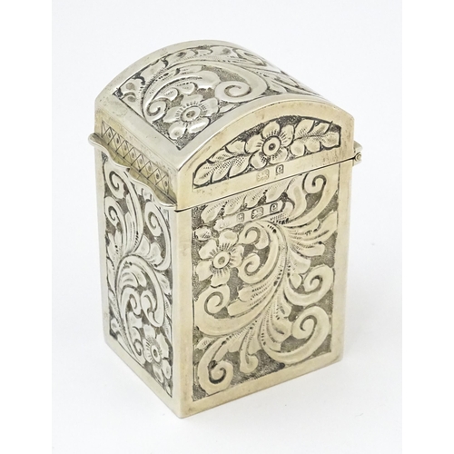 448 - A silver playing card box with embossed floral and foliate decoration and gilded interior, hallmarke... 