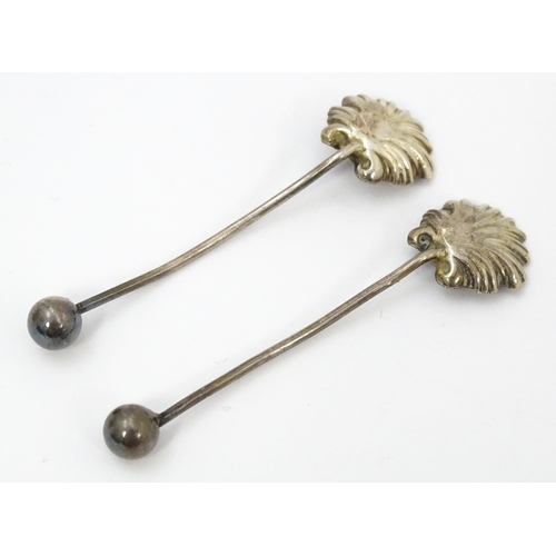 451 - A pair of Victorian silver salts and salt spoons of shell form, hallmarked Birmingham 1893, maker CB... 