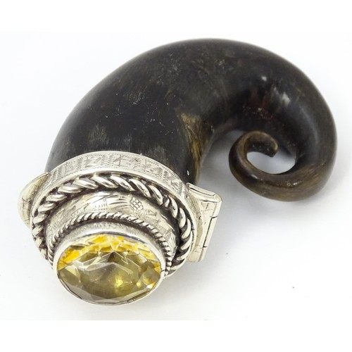 1234 - A 19thC Scottish ram horn snuff mull with white metal mount set with facet cut cairngorm. Indistinct... 