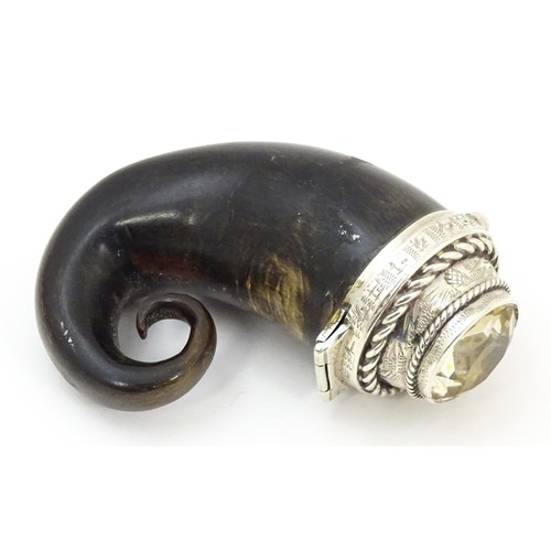 1234 - A 19thC Scottish ram horn snuff mull with white metal mount set with facet cut cairngorm. Indistinct... 