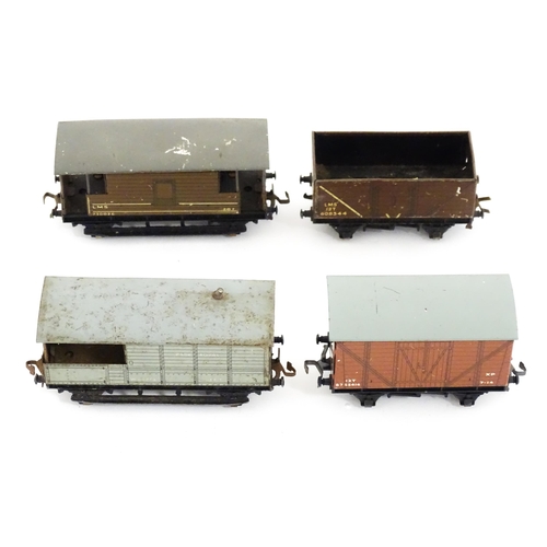 1437 - Toys: A quantity of die cast scale model 00 gauge railway items to include Trix Twin Railway and Hor... 