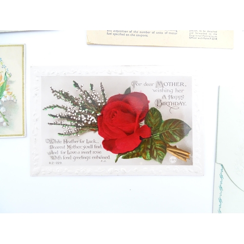 1553 - A quantity of assorted ephemera to include early 20thC greetings cards, a 20thC first class menu fro... 