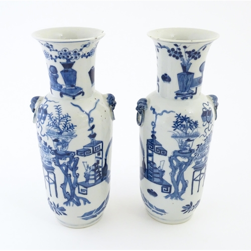 1 - A pair of Chinese blue and white vases with cast lion mask and ring handles, decorated with various ... 
