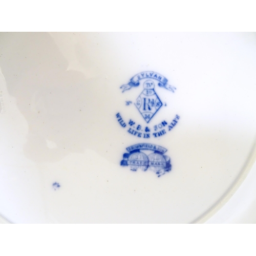 104 - A Brownfield & Son blue and white plate depicting a mountain goat and bird of prey from the Wild Lif... 