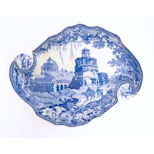 111 - A Rogers blue and white dish of shaped form in the Monopteros pattern. Impressed marks under. Approx... 