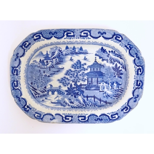 112 - A Spode blue and white dish of oval form in the Flying Pennant pattern. Approx. 10 1/2