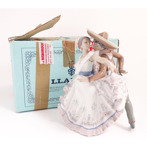 116 - A Lladro figural group Mexican Dancers, no. 5415. With box. Approx. 12