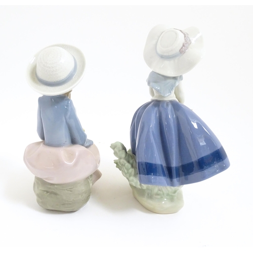 118 - Two Lladro figural group comprising Pretty & Prim no. 5554, and Pretty Pickings no. 5222. With boxes... 