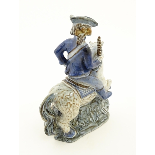 130 - A Danish pottery model of a figure on horseback by L. Hjorth. Marked under L. Hjorth Denmark. Approx... 