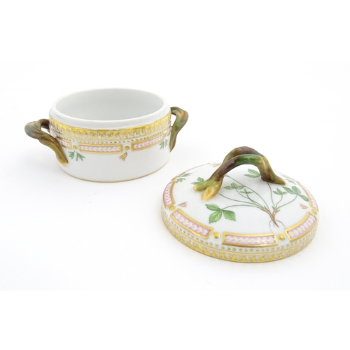 133 - A Royal Copenhagen Flora Danica twin handled sugar bowl and cover decorated with Anemone Groenlandia... 
