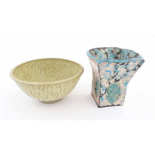 150 - Two items of studio pottery to include a bowl by Audrey Stockwin, and a slab vase of flared form wit... 