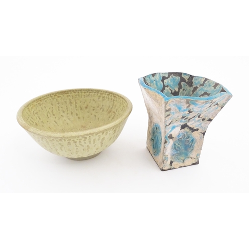 150 - Two items of studio pottery to include a bowl by Audrey Stockwin, and a slab vase of flared form wit... 