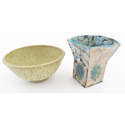 150 - Two items of studio pottery to include a bowl by Audrey Stockwin, and a slab vase of flared form wit... 