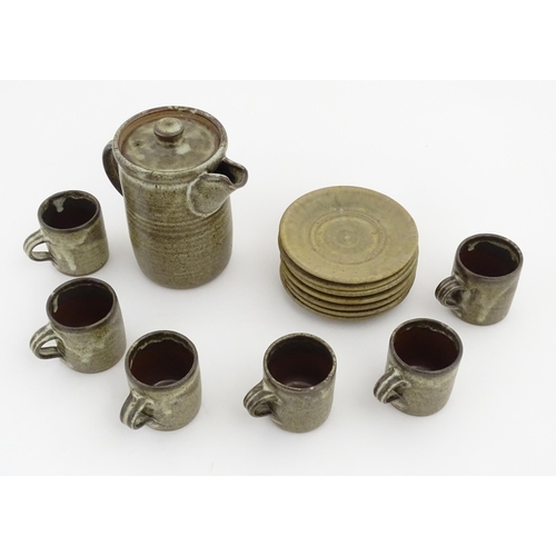 154 - Six studio pottery John Leach Muchelney Pottery coffee cups. Marked under. Together with an associat... 