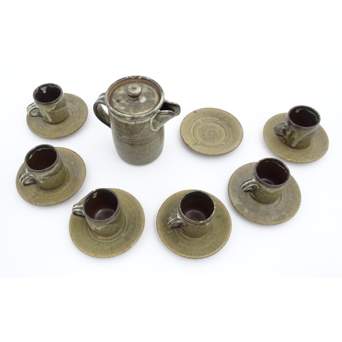 154 - Six studio pottery John Leach Muchelney Pottery coffee cups. Marked under. Together with an associat... 