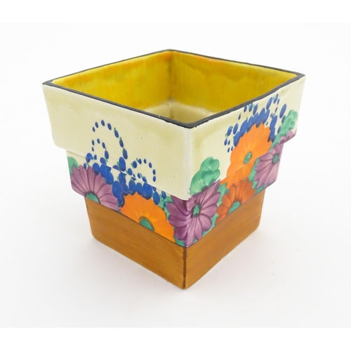 160 - A Clarice Cliff fern plant pot of squared stepped form decorated in the Gayday pattern. Shape no. 36... 