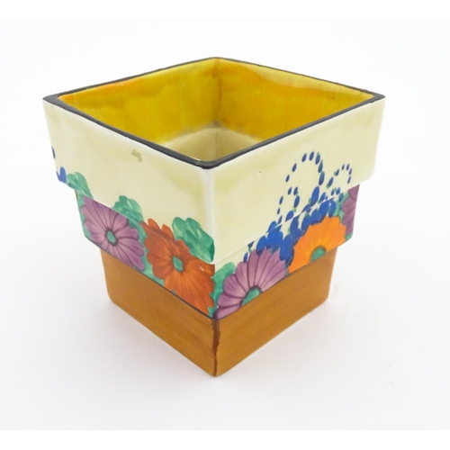 160 - A Clarice Cliff fern plant pot of squared stepped form decorated in the Gayday pattern. Shape no. 36... 
