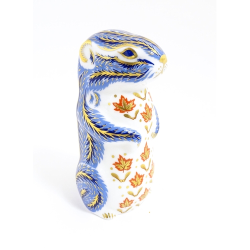 168 - A Royal Crown Derby paperweight modelled as a chipmunk. With gold stopper. Approx. 4