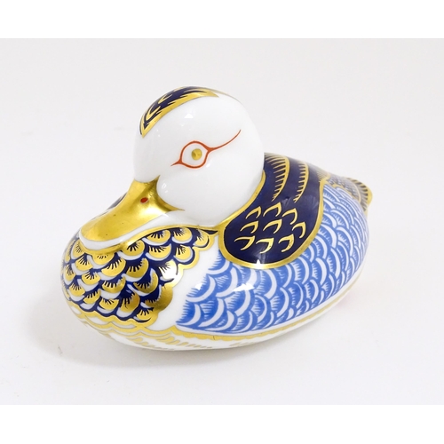 169 - A Royal Crown Derby paperweight modelled as a duck. With gold stopper. Approx. 2 1/2