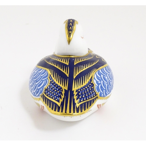 169 - A Royal Crown Derby paperweight modelled as a duck. With gold stopper. Approx. 2 1/2
