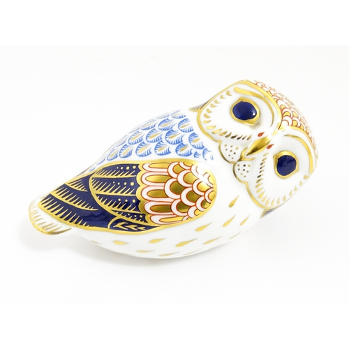 171 - A Royal Crown Derby paperweight modelled as an owl. With gold stopper. Approx. 3