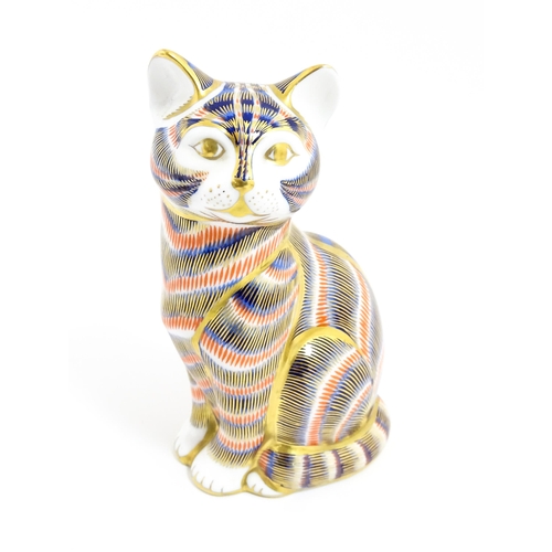 172 - A Royal Crown Derby paperweight modelled as a cat. Approx. 5