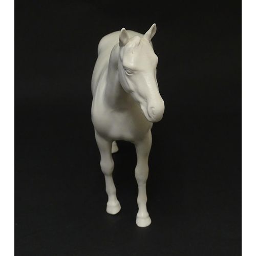 178 - A Beswick model of a matte white horse. Marked under. Approx. 7 3/4