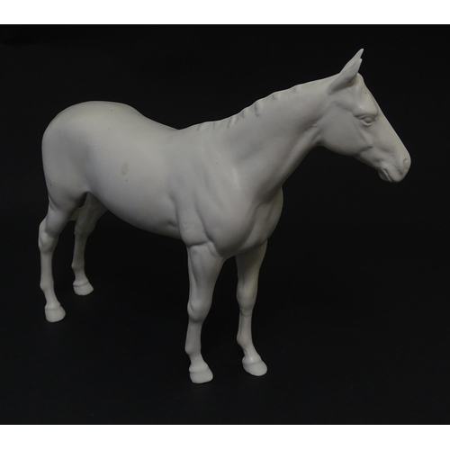 178 - A Beswick model of a matte white horse. Marked under. Approx. 7 3/4