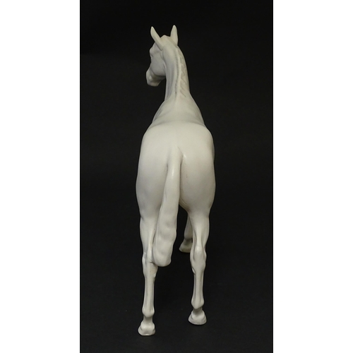 178 - A Beswick model of a matte white horse. Marked under. Approx. 7 3/4