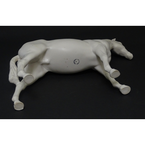 178 - A Beswick model of a matte white horse. Marked under. Approx. 7 3/4