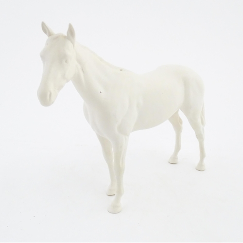 178 - A Beswick model of a matte white horse. Marked under. Approx. 7 3/4