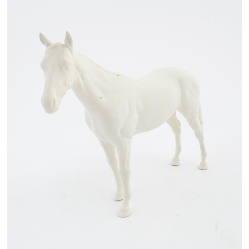 178 - A Beswick model of a matte white horse. Marked under. Approx. 7 3/4