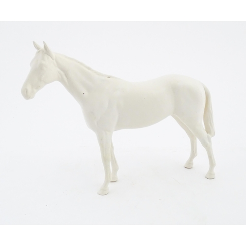 178 - A Beswick model of a matte white horse. Marked under. Approx. 7 3/4