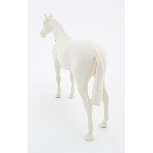 178 - A Beswick model of a matte white horse. Marked under. Approx. 7 3/4