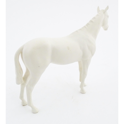 178 - A Beswick model of a matte white horse. Marked under. Approx. 7 3/4