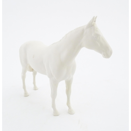 178 - A Beswick model of a matte white horse. Marked under. Approx. 7 3/4