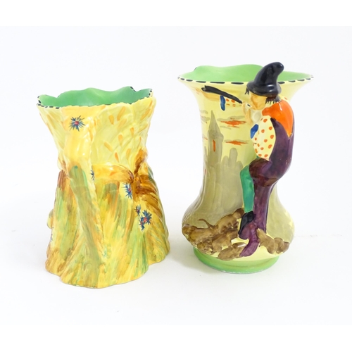 204 - An Art Deco Burleigh Ware Pied Piper jug with figural handle and hand painted castle detail. Togethe... 