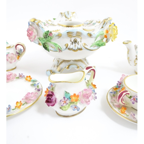 209 - A Coalport Coalbrookdale inkwell with encrusted flower detail and gilt highlights. Marked under. Tog... 