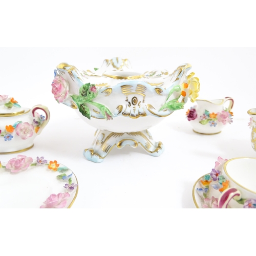 209 - A Coalport Coalbrookdale inkwell with encrusted flower detail and gilt highlights. Marked under. Tog... 