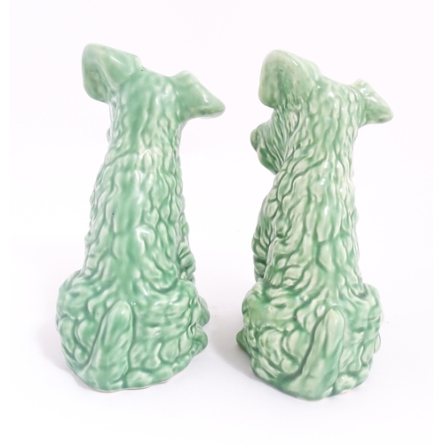 218 - Two Sylvac pottery models of terrier dogs with a green glaze, model no. 1379. Both marked under. App... 