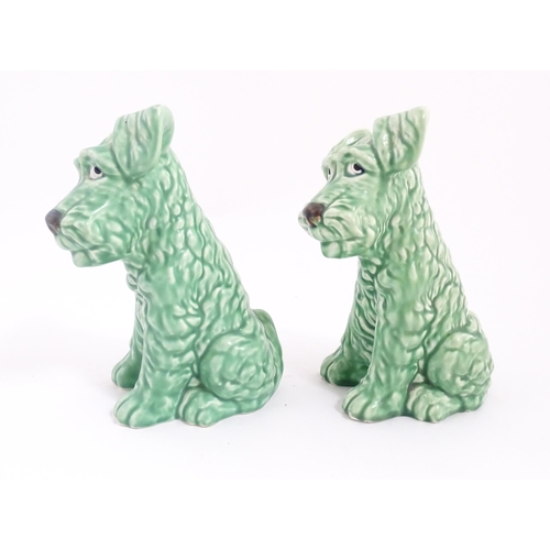 218 - Two Sylvac pottery models of terrier dogs with a green glaze, model no. 1379. Both marked under. App... 