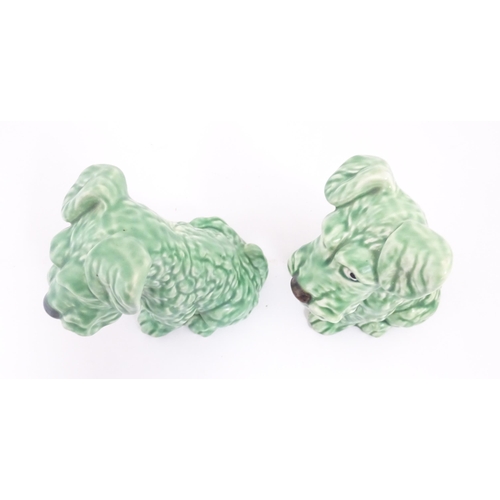 218 - Two Sylvac pottery models of terrier dogs with a green glaze, model no. 1379. Both marked under. App... 