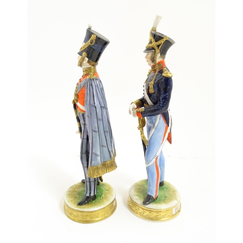 220 - Two Kaiser soldier / military figures. Marked under. Largest approx. 9