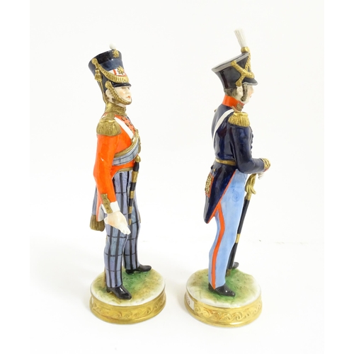 220 - Two Kaiser soldier / military figures. Marked under. Largest approx. 9