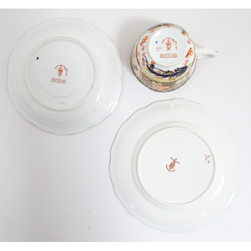 235 - A quantity of Royal Crown Derby tea wares decorated in the Imari palette to include cake plate, cups... 