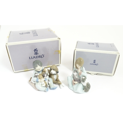 242 - Two Lladro figures comprising New Playmates, model no. 5456, and Cat Nap no. 5640. Cat Nap approx. 5... 