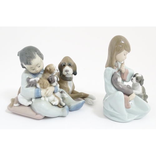 242 - Two Lladro figures comprising New Playmates, model no. 5456, and Cat Nap no. 5640. Cat Nap approx. 5... 