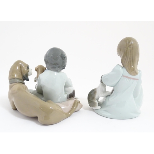 242 - Two Lladro figures comprising New Playmates, model no. 5456, and Cat Nap no. 5640. Cat Nap approx. 5... 