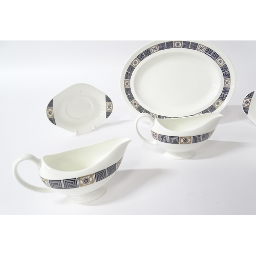 251 - A quantity of Wedgwood dinner wares in the Asia pattern to include plates, twin handled soup bowls, ... 