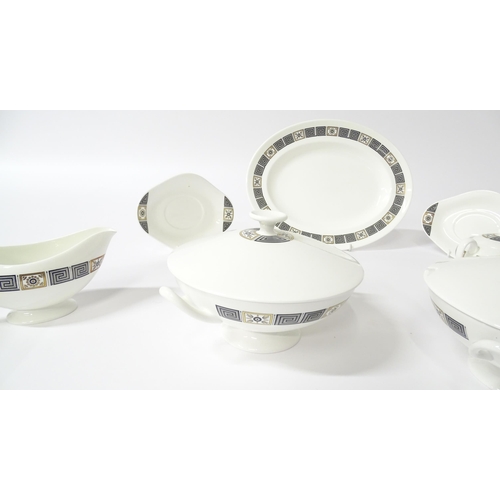 251 - A quantity of Wedgwood dinner wares in the Asia pattern to include plates, twin handled soup bowls, ... 